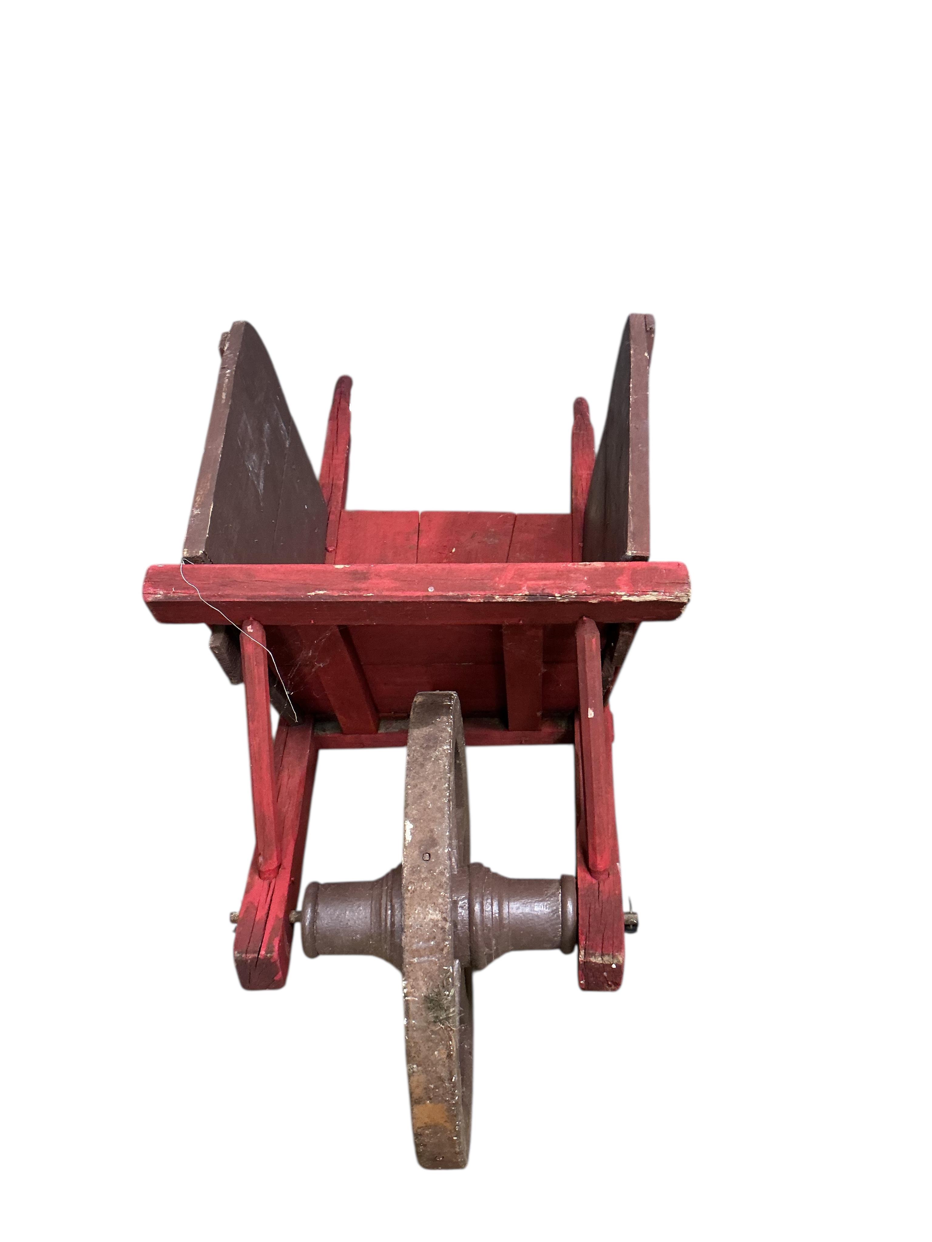 A painted rustic garden wheelbarrow, width 58cm, length 158cm, height 70cm